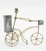 Furnshine - Wyndham Golden Iron Painted Men On Cycle Pen Stand/Pencil Holder - Image 2