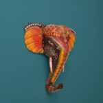 Furnshine - Hand Painted Orange Wooden Ganesha Elephant Face Wall Hanging | 12x12 Inch Rajasthani Religious Decor for Pooja Room, Diwali