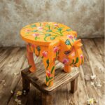 Furnshine - Orange Wooden Elephant Stool with Floral Designs - Indian Handicraft for Home Decor, Pooja & Foyer (8"H x 10.5"L x 8"W)