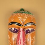 Furnshine - Handcrafted Orange Wooden Tribal Wall Mask – Nazar Battu for Home Entrance, Living Room & Ethnic Decor – 9 Inch Traditional Indian Art Hanging - Image 3